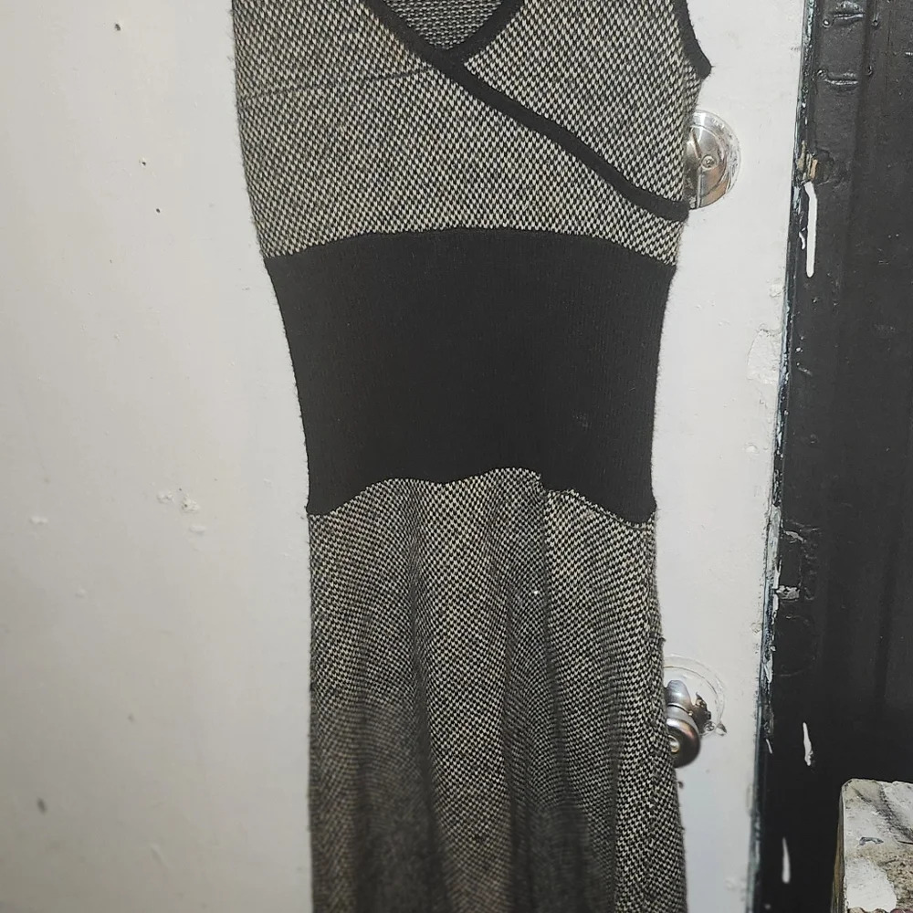 Neck  sweater dress is by moda